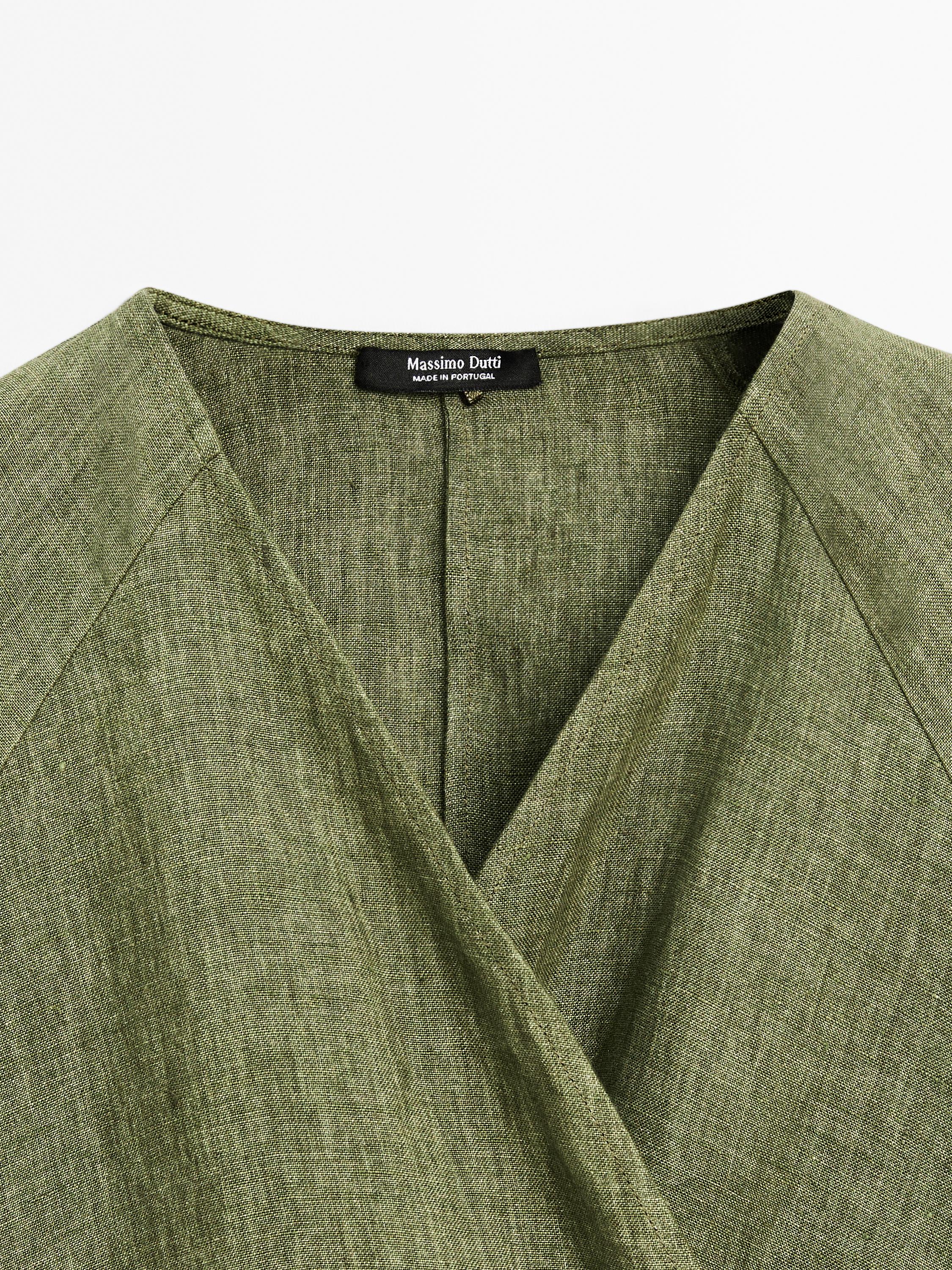 Flowing linen blouse with tie detail at the waist